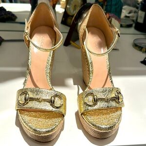 Gucci Leather Platform Espadrilles
•   Gold
•   Horsebit Accent
•   Jute Trim